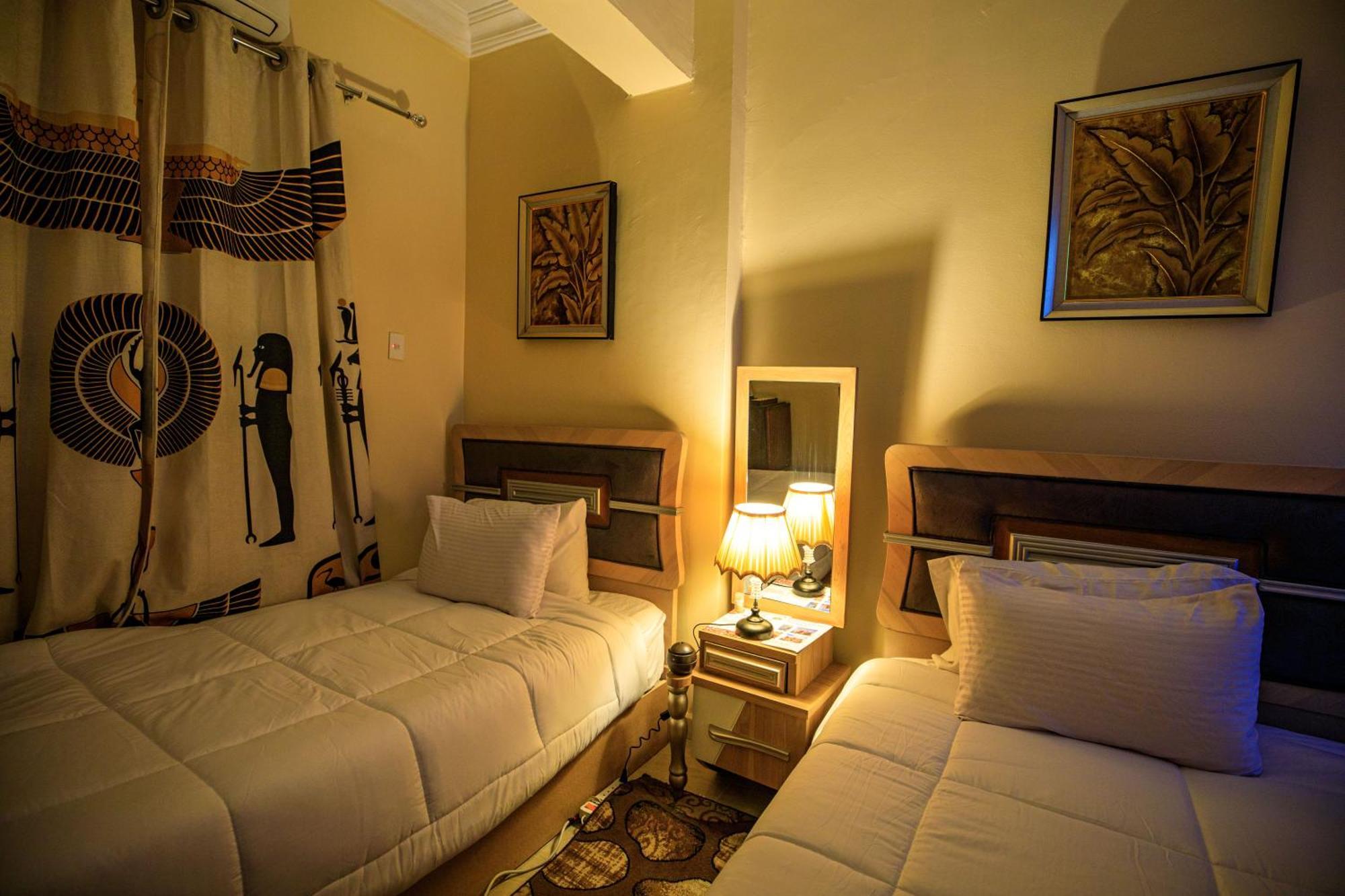 Bella Casa Pyramids Inn Nazlet el-Sisi Bagian luar foto
